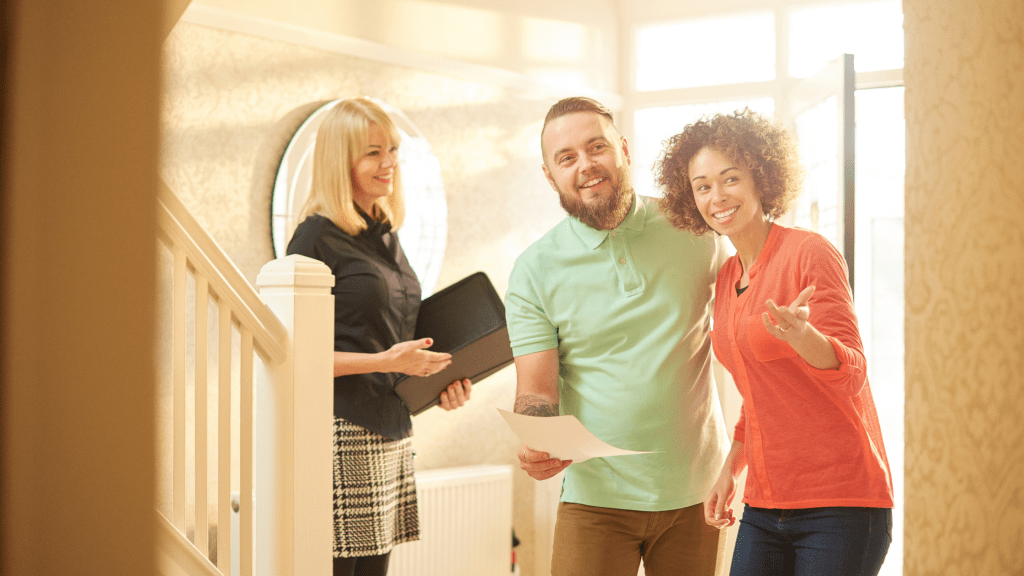 buyers looking at a home for sale and happy with what they see 